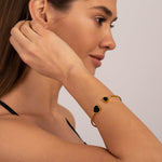 Gold Open Cuff Bracelet with Black Heart Accents - Bracelets