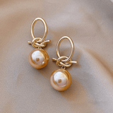 Golden Knot Statement Earrings with Champagne Pearl Drop – Modern Elegance - Earrings